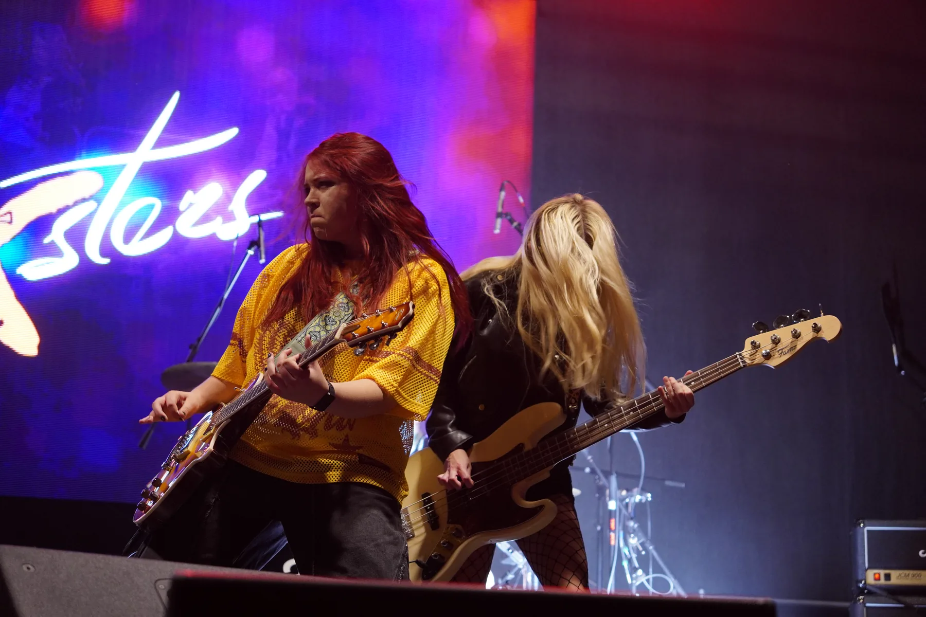Guitarists playing together