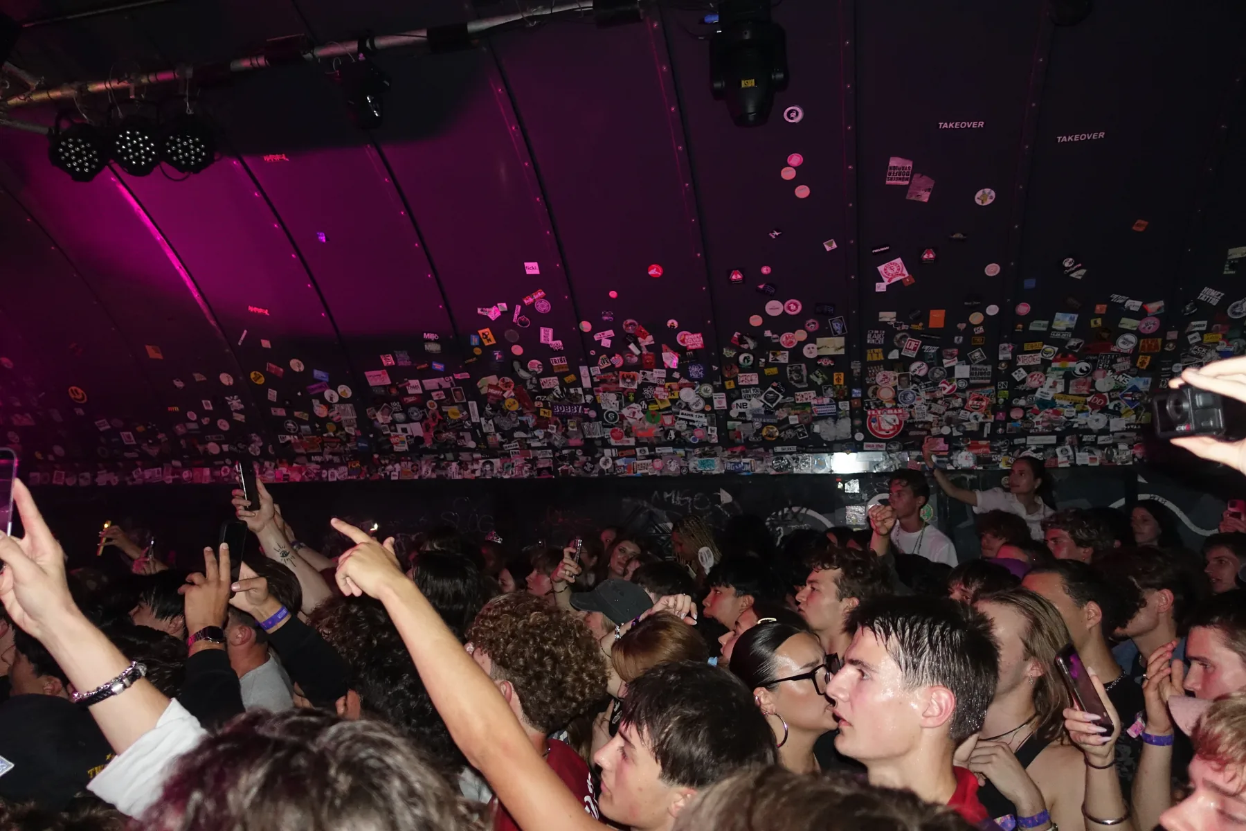Audience with raised hands